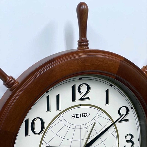 Настенные часы с маятником SEIKO QXC242B в виде штурвала Настенные часы с маятником SEIKO QXC242B в виде штурвала